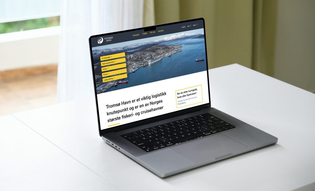 Mockup av nettsiden på en laptop