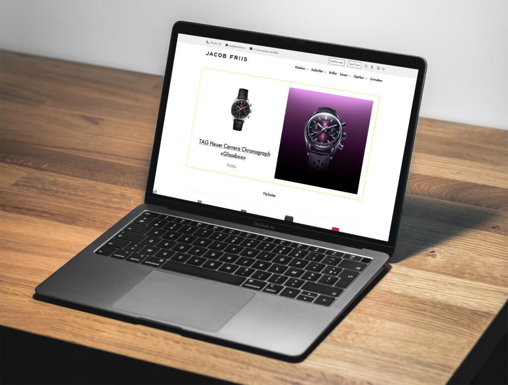 Mockup av nettsiden på en laptop