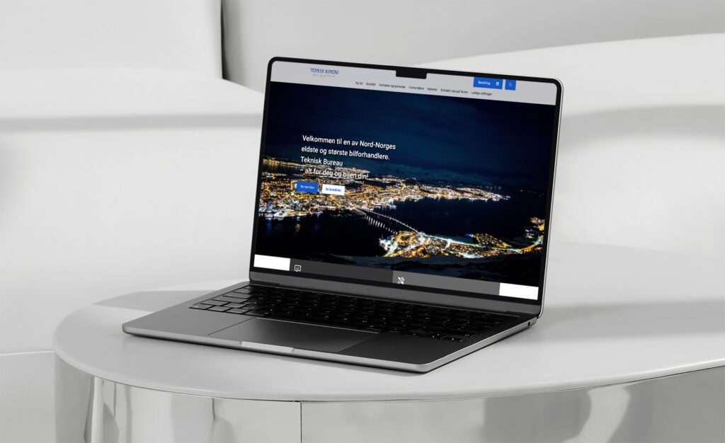 Mockup av nettsiden på laptop